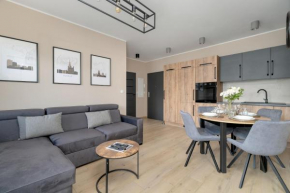 Cosy and Bright Apartment with Parking in Poznan by Noclegi Renters